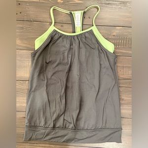Ivivva by Lululemon tank top. Built in shelf bra. Great condition! Size 12.